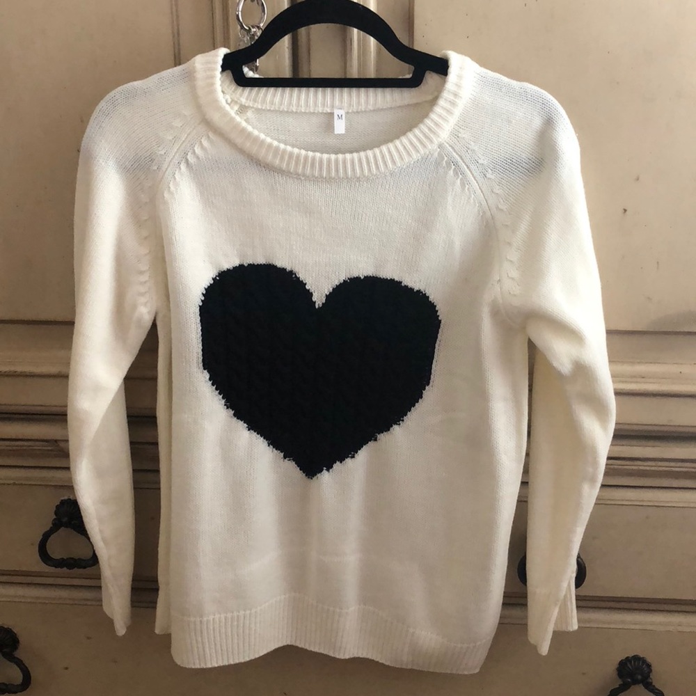 white and black sweater